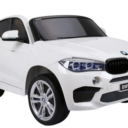 BMW X6M baltas – elektrinis automobilis vaikams