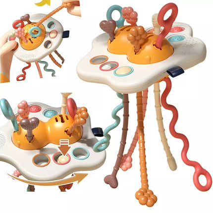 „WOOPIE BABY“ Montessori sensorinis žaislas – kramtukas, barškučiai ir daugiafunkcis „UFO“ žaislas