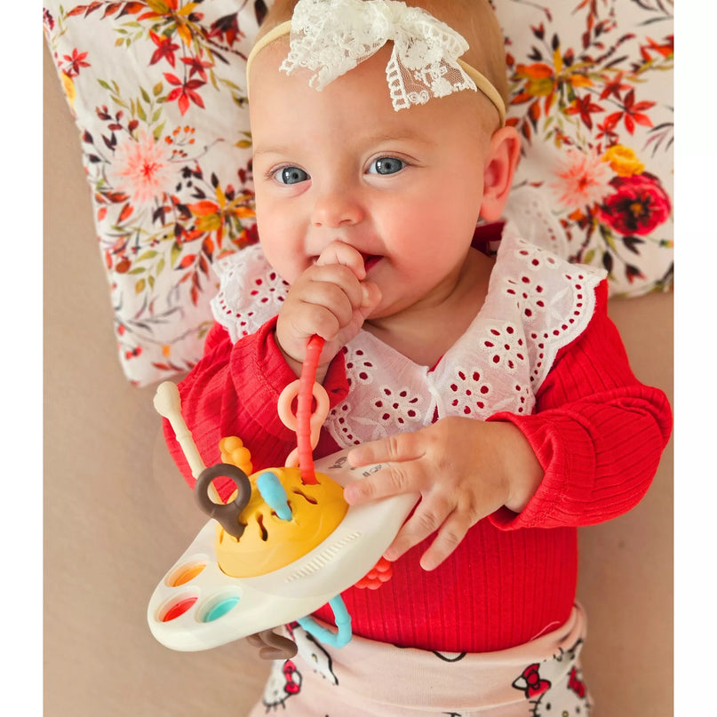 „WOOPIE BABY“ Montessori sensorinis žaislas – kramtukas, barškučiai ir daugiafunkcis „UFO“ žaislas