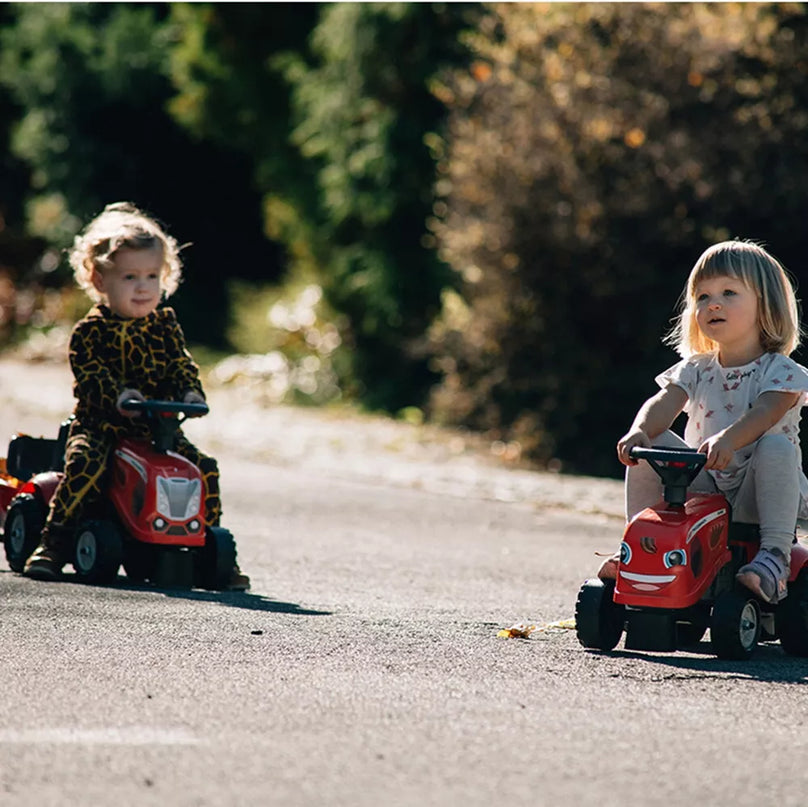 Falk Baby Mac Cormick traktoriukas–stumdukas su priekaba, įrankiais ir lipdukais