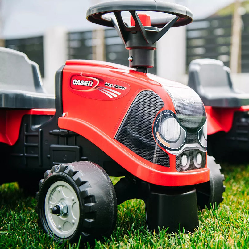 Falk Baby Case IH traktoriukas–stumdukas su priekaba, įrankiais ir lipdukais