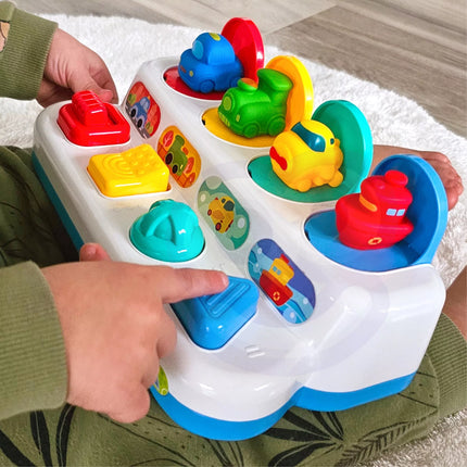 WOOPIE BABY edukacinis žaislas „Pop-Up“ transporto priemonės