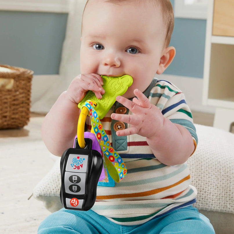 FISHER-PRICE LAUGH AND LEARN žaisliniai automobilio rakteliai (HVH43)