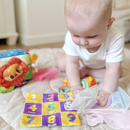 WOOPIE BABY edukacinis sensorinis žaislas „Lady Tag“ servetėlių dėžutė