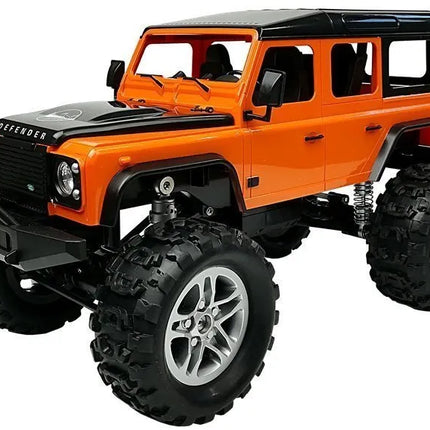 Land Rover Defender R/C 1:14 oranžinis