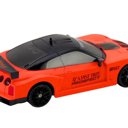 Oranžinis R/C sportinis automobilis 1:24