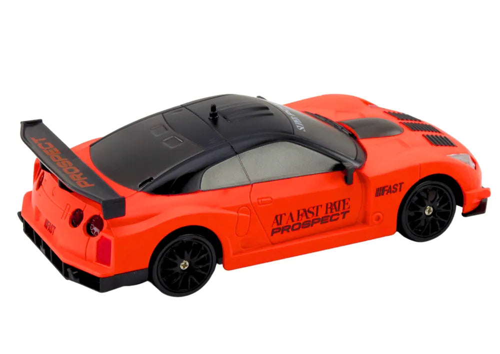 Oranžinis R/C sportinis automobilis 1:24