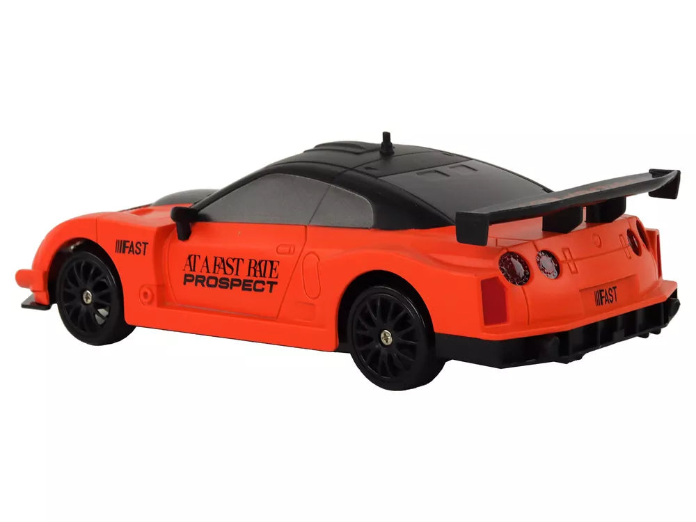 Nuotoliniu būdu valdomas sportinis automobilis R/C 1:24 oranžinės spalvos keičiamais ratais