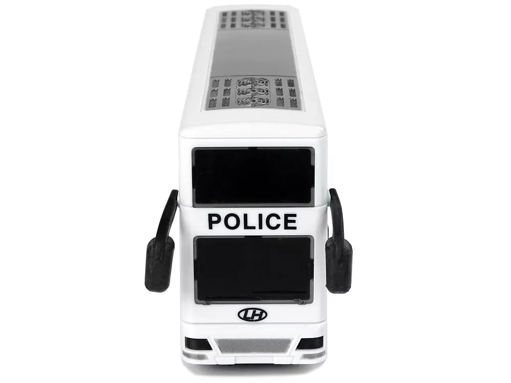 Baltas dviaukštis policijos autobusas