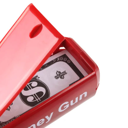 Raudona Money Gun pinigų šaudyklė – su banknotais