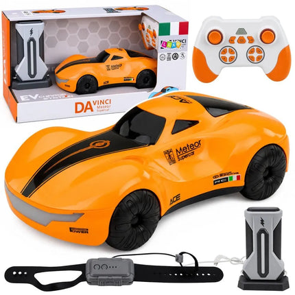 RC automobilis su valdymu gestais, šviesomis ir dūmų efektu, oranžinis