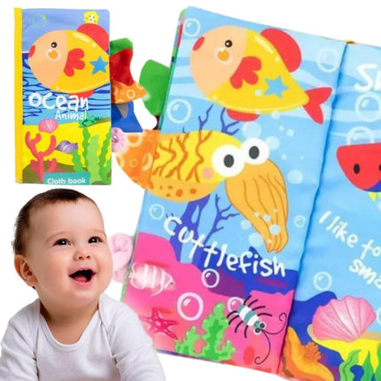 WOOPIE BABY Čerškiančių audinių knyga su jūros gyvūnų uodegomis