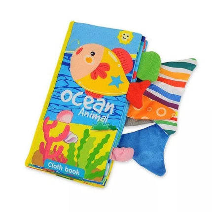 WOOPIE BABY Čerškiančių audinių knyga su jūros gyvūnų uodegomis