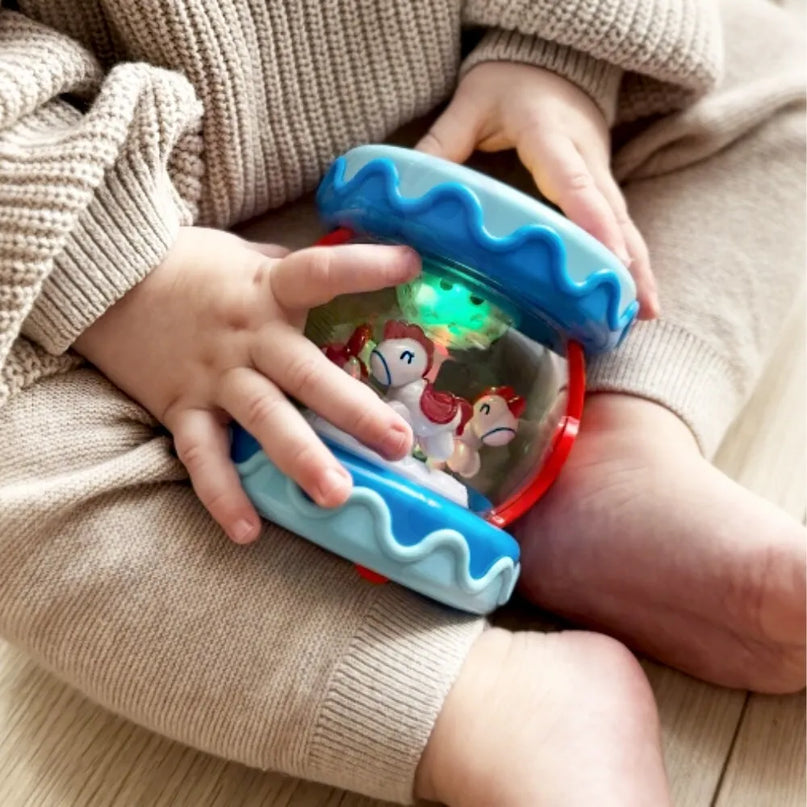 Woopie Baby muzikinis būgnelis 3in1 su žvaigždžių projektoriumi