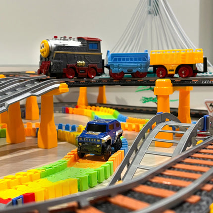 „WOOPIE“ elektrinis traukinys 2in1 lenktynių trasa – viadukas ir automobiliai (XXL, 192 vnt.)