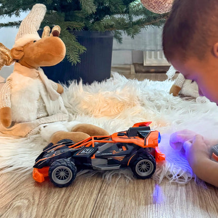 Woopie nuotoliniu būdu valdomas oranžinis visureigis su LED ir garų efektu (2.4 GHz)